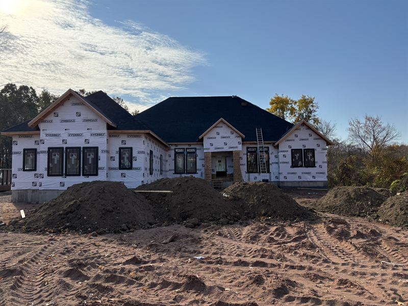 New house under construction, wrapped and dried in.