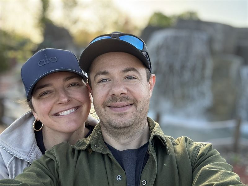 The owners of San Diego Spray Foam outdoors in company caps.