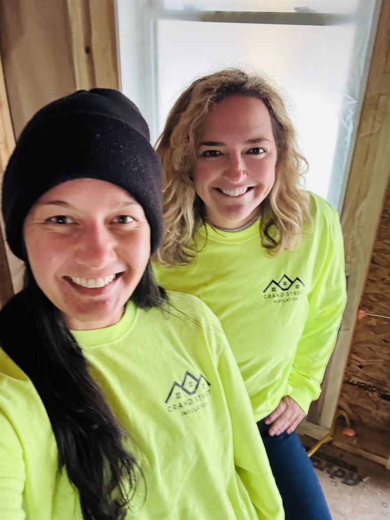 Two San Diego Spray Foam team members on a job site.
